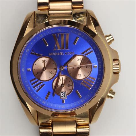 michael kors bradshaw blue dial.